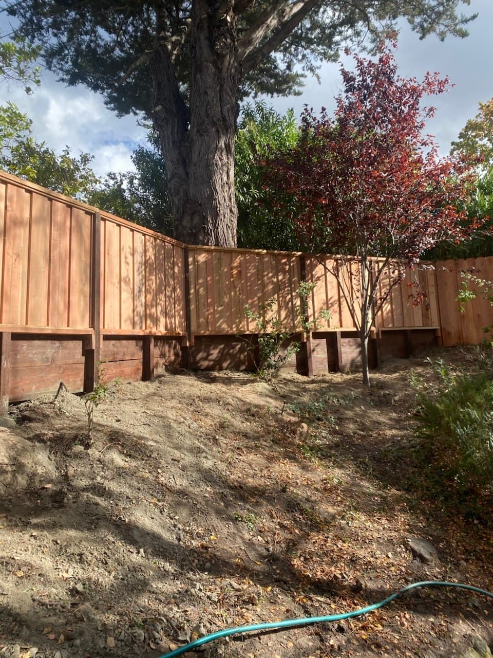 Board On Board Solid Fnece With 2' Retaining Wall