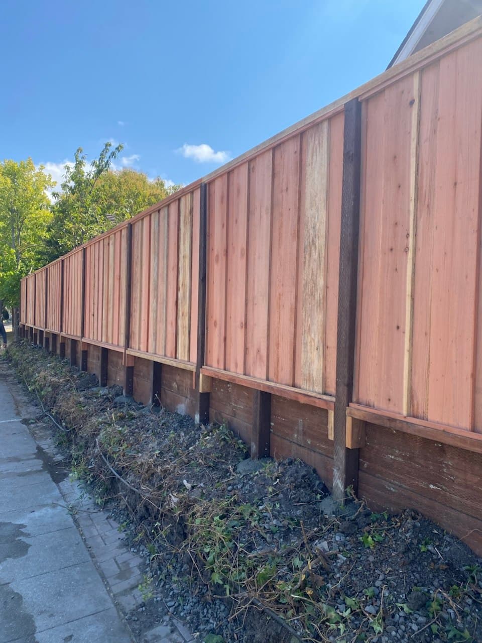 Stanrdard Board On Board Fence With 2' Retaining Wall